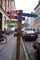colourful sign in copenhagen, indicating directions fortjald, kunst, keramik...
